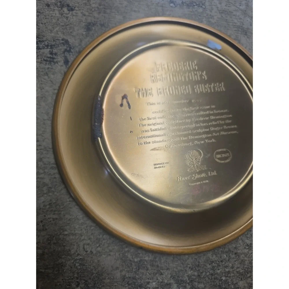 FREDERIC REMINGTON'S BRONZE COLLECTORS PLATE THE BRONCO BUSTER